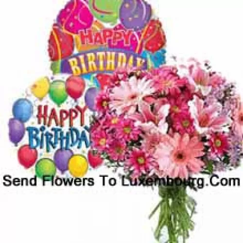 Assorted Flowers In A Vase Along With Birthday Balloons