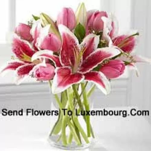Pink Lilies And Pink Tulips In A Glass Vase