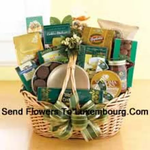 Start a tradition of sending good taste to your mom this year. Our classic wicker basket comes piled high with a gourmet assortment that is sure to please your mom. We accent the basket with green and gold ribbon and accents to make a great impression. Inside, your mom will discover an assortment that features something for everyone: Lindt chocolate truffles, smoked almonds, walnut cookies, chocolate cookies, chocolate-covered popcorn, cheese, crackers, a Ghirardelli chocolate bar, tortilla chips, salsa, chocolate wafer cookies , cheese swirls, and chocolate-covered sandwich cookies. (Please Note That We Reserve The Right To Substitute Any Product With A Suitable Product Of Equal Value In Case Of Non-Availability Of A Certain Product)
